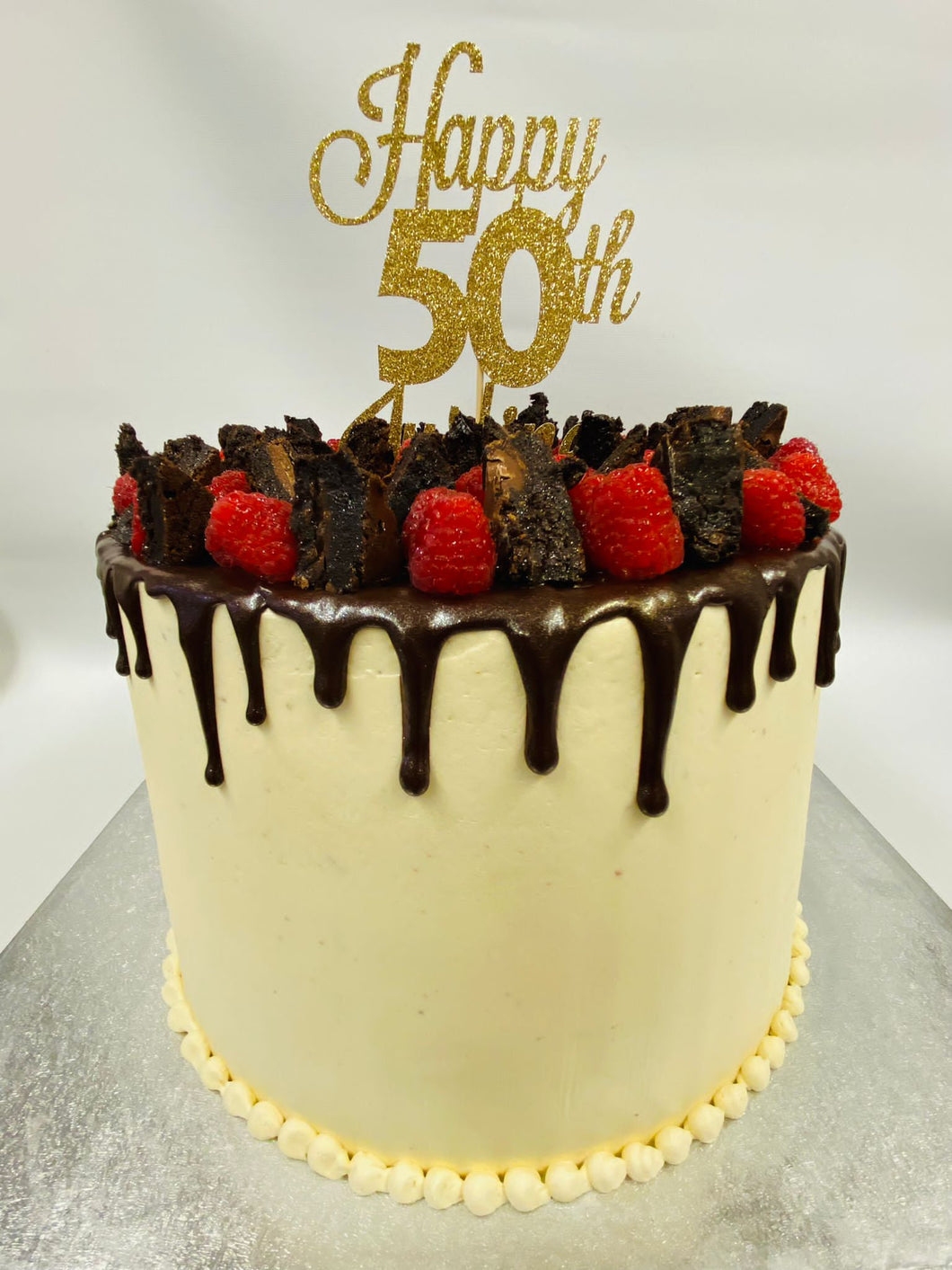 Yummy chocolate drip cake to celebrate a 50th birthday. | Music birthday  cakes, Farm cake, Drip cakes